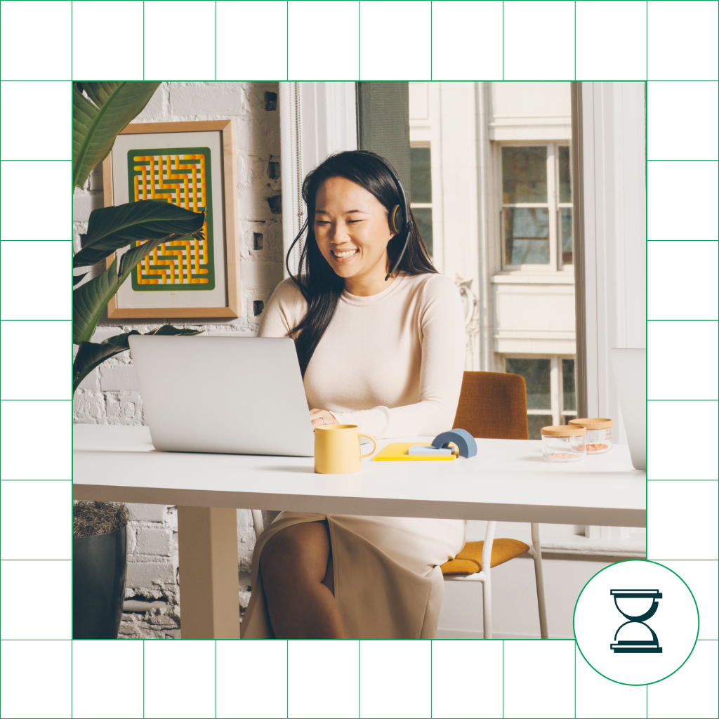 woman at computer smiling