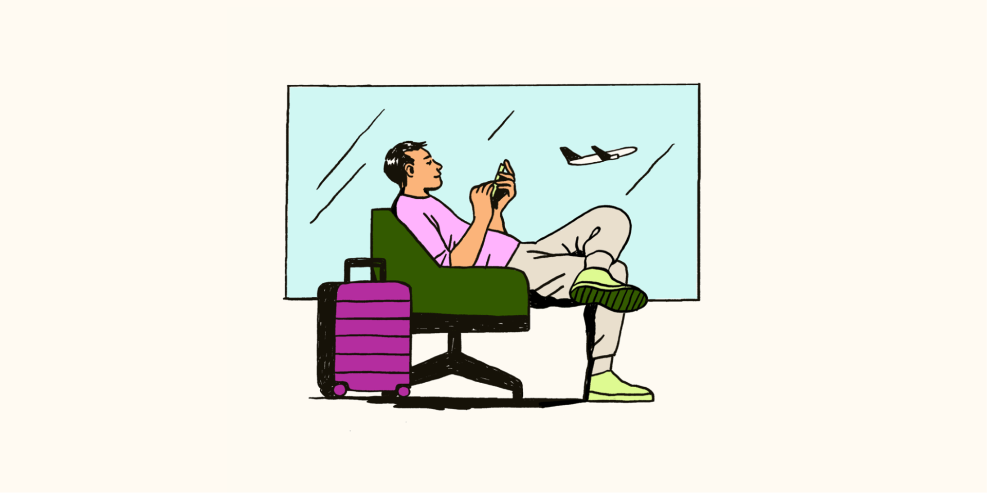 A customer sits at an airport while looking at his phone.