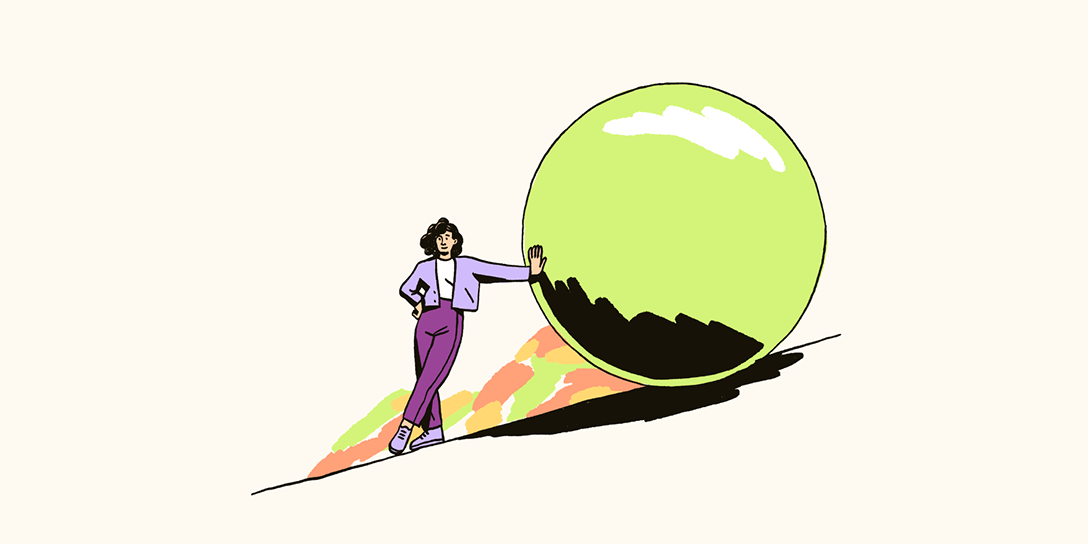 A human resource manager in a purple suit leans against a large green orb on a hill. 