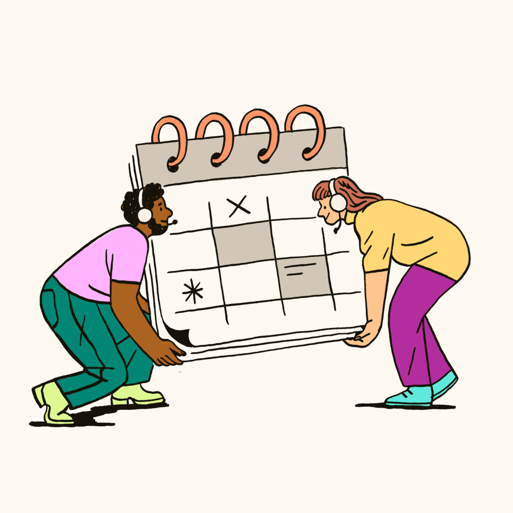 Two people carrying a calendar