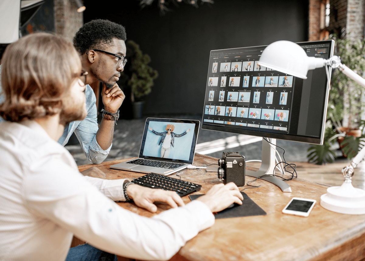 Capture team members at work in front of a computer