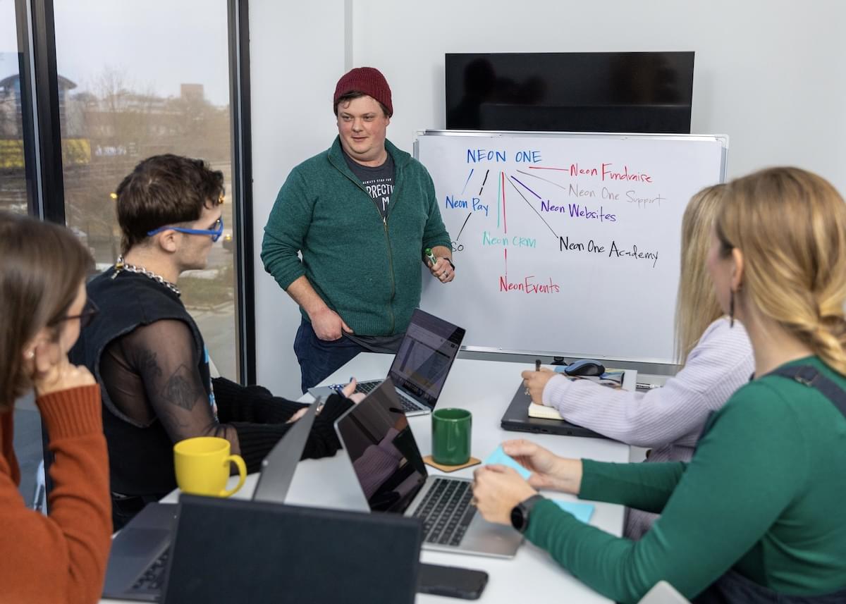 Neon One employees at work